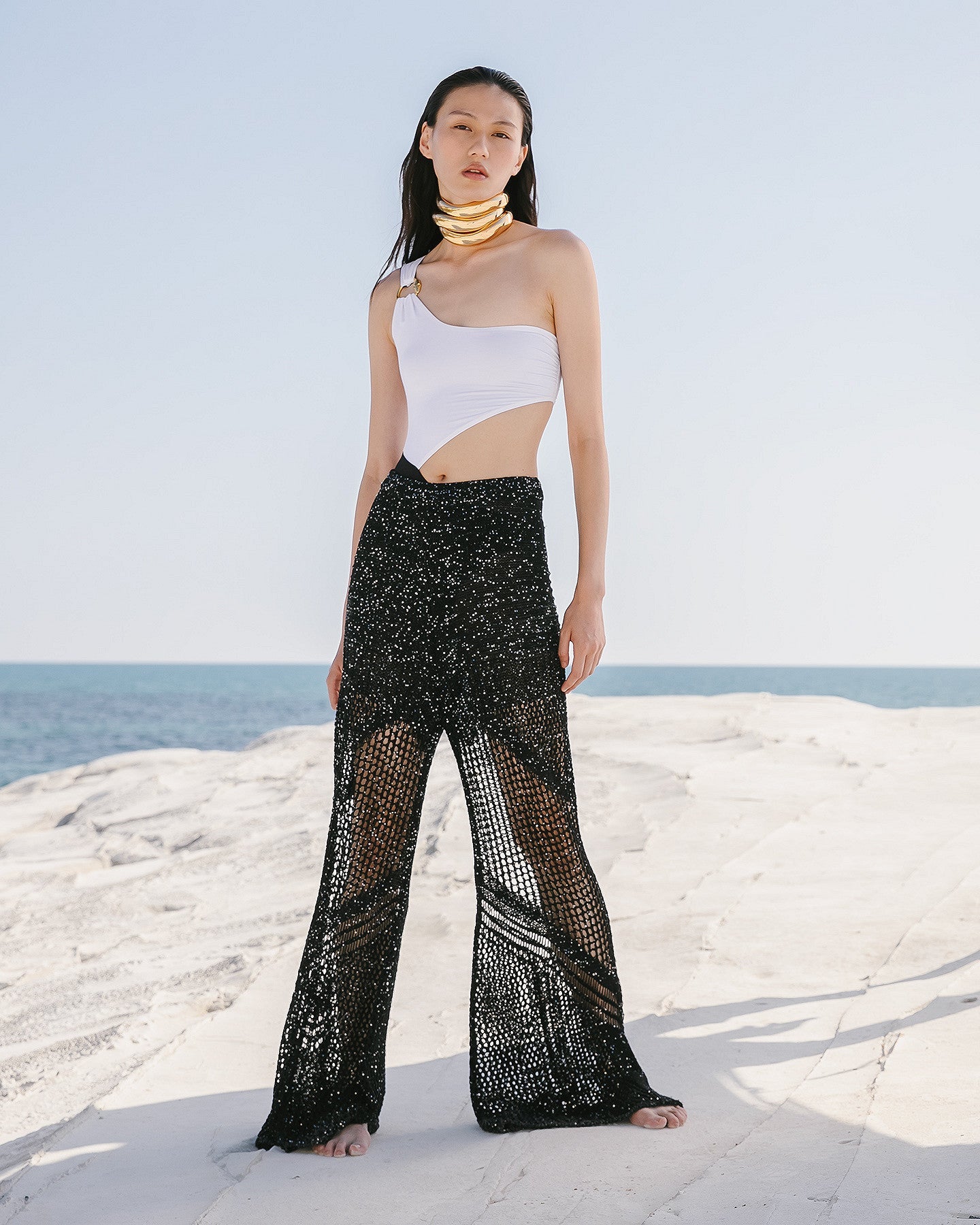Pantalon Starlet - Noir : Long pantalon élégant en maille ajourées et pailletées noires Mes Demoiselles